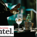 Gin and tonic being poured in a bar