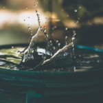 Water splashing on a barrel