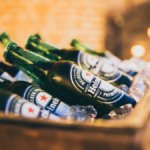 Heineken bottles lying in a crate