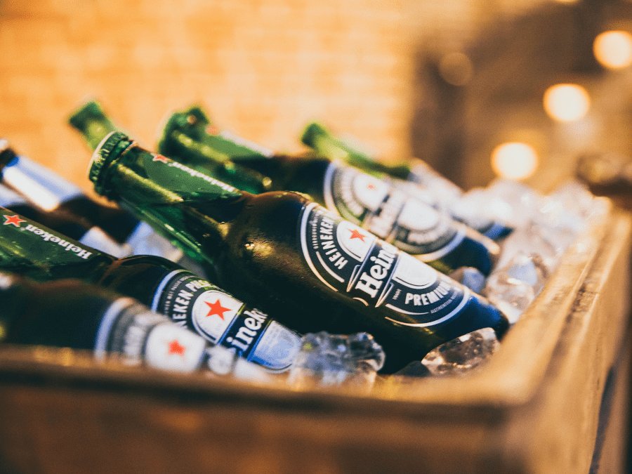 Heineken bottles lying in a crate