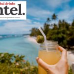 Drink with beach in background
