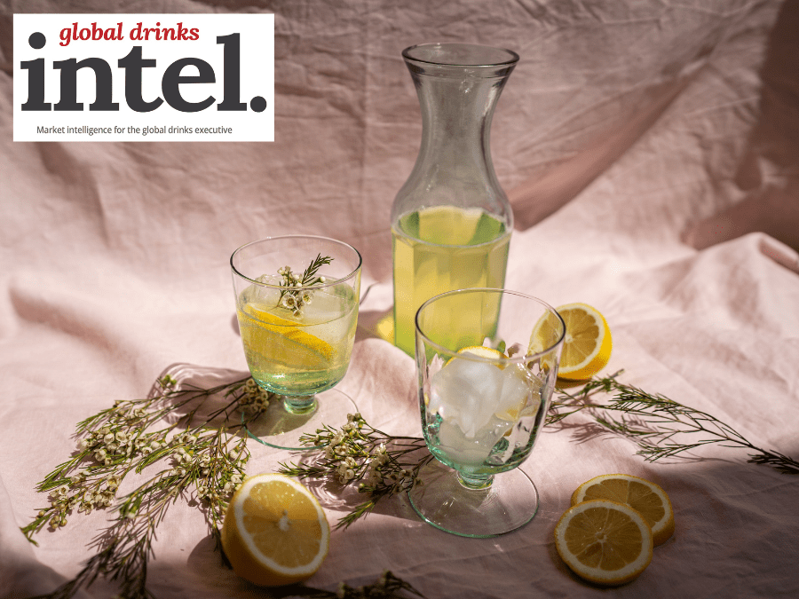 Limoncello bottle and glasses with lemons