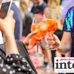 Aperol Spritz serves being photographed with smartphone