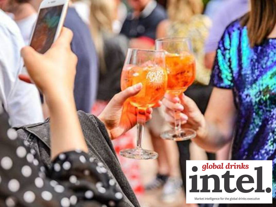 Aperol Spritz serves being photographed with smartphone