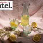Limoncello bottle and glasses with lemons