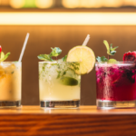 Three cocktails on a bar