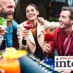 Consumers toasting with cocktails