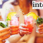Four vodka-based cocktails held towards the camera