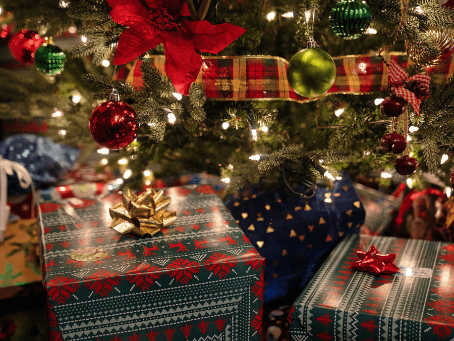 Wrapped presents under a Christmas tree
