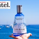 Bottle of Gin Mare with sea background