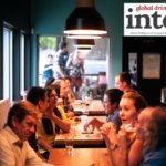 Customers sitting at tables in a pub/bar/restaurant