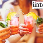 Four vodka-based cocktails held towards the camera