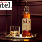 Bell's blended scotch bottle with glass