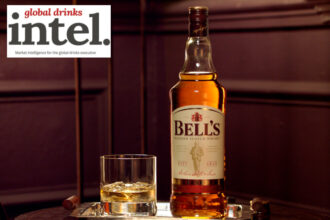 Bell's blended scotch bottle with glass