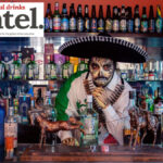 Bartender dressed for Day of the Dead