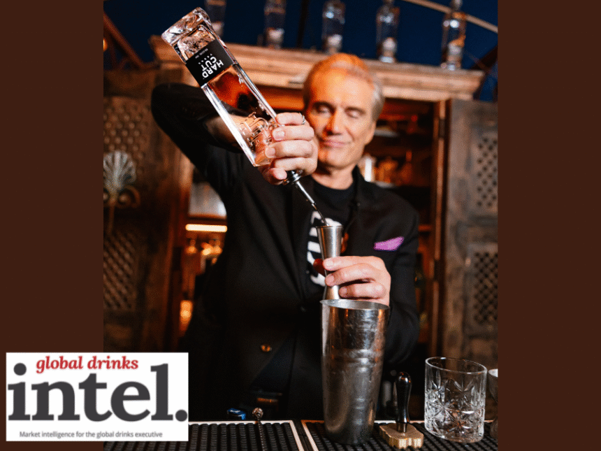 Dolph Lundgren pouring Hard Cut Vodka behind a bar