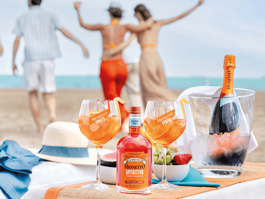 Two Henkell Freixenet brands on a table on a beach