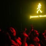 Johnnie Walker logo on wall of entertainment venue
