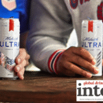 Michelob Ultra cans on a bar table
