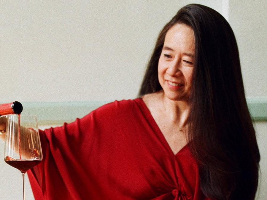 Queena Wong with a glass of wine