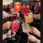 Six branded glasses, all brands owned by Campari Group
