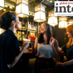 Three female drinkers in a bar