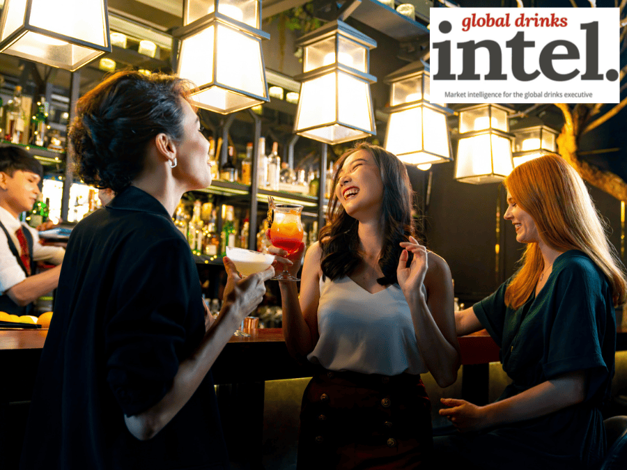Three female drinkers in a bar