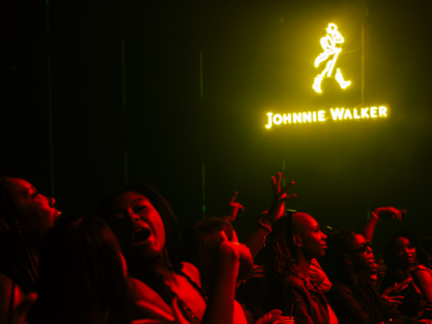 Johnnie Walker logo on wall of entertainment venue