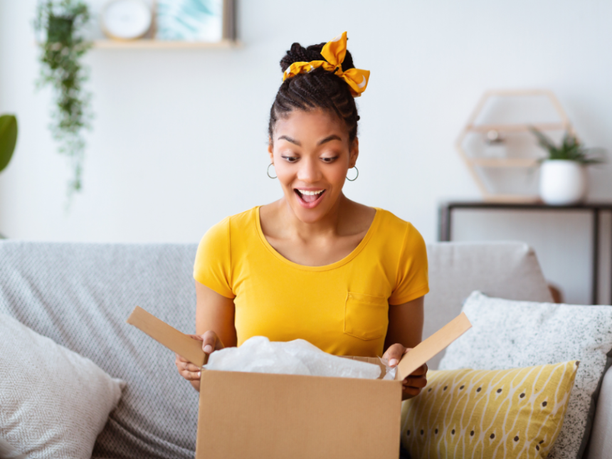 A woman opening a box