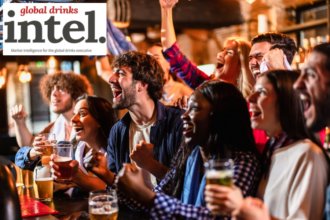 Drinkers at a bar watching sport