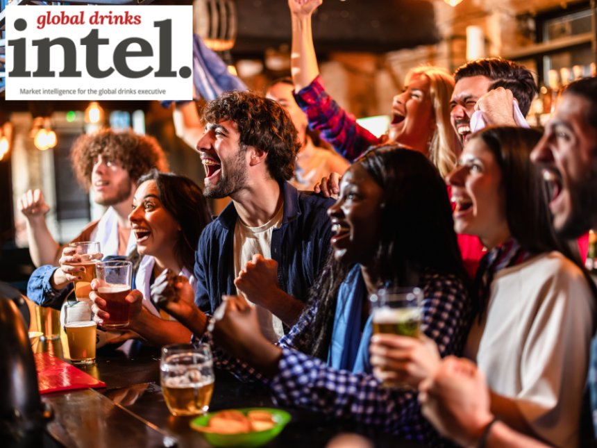 Drinkers at a bar watching sport