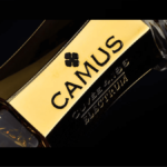 Close-up of Camus branding on a cognac bottle