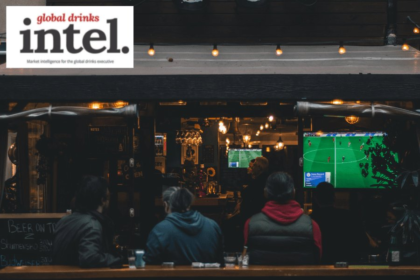 View into an on-premise venue showing sport on a television