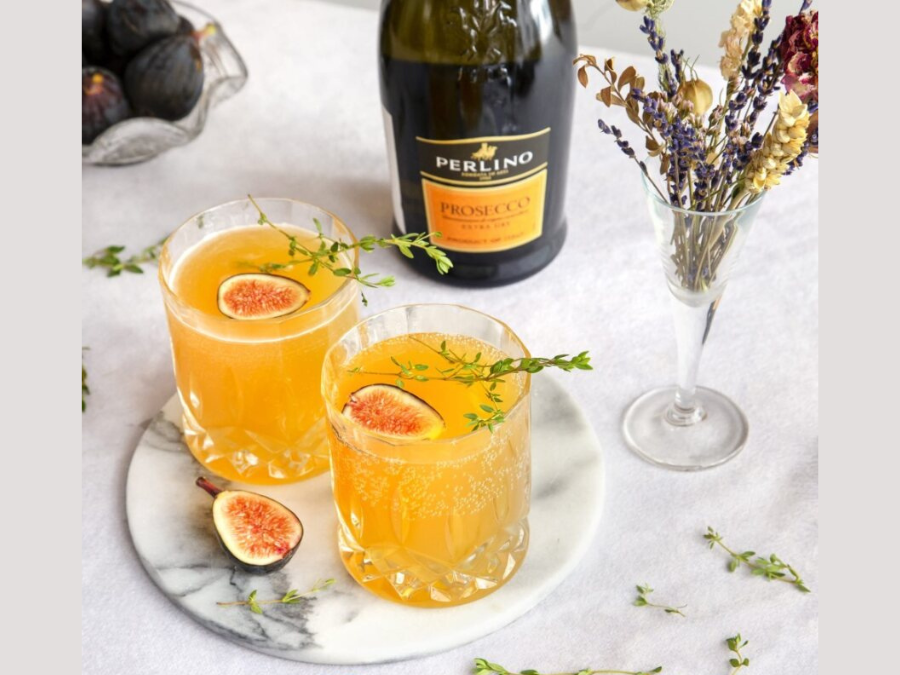 Bottle of Perlino prosecco with two drinks serves