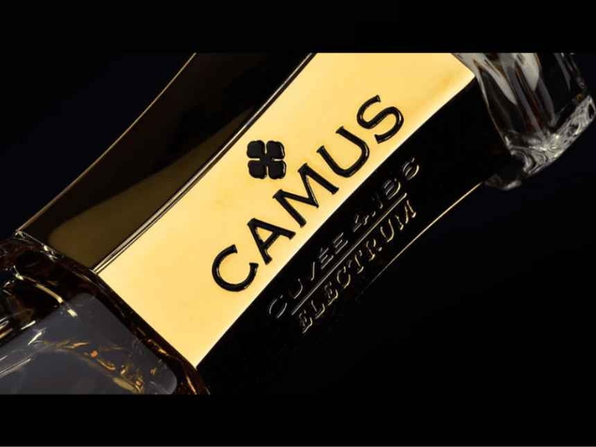 Close-up of Camus branding on a cognac bottle