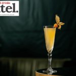 Cocktail with garnish on a bar