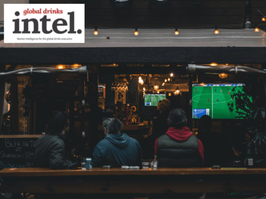 View into an on-premise venue showing sport on a television