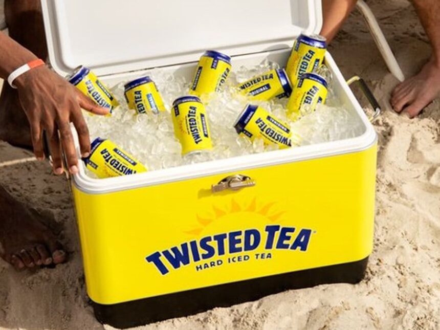 Cans of Twisted Tea in a branded cooler