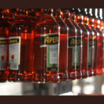 Aperol bottles on a production line