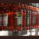 Aperol bottles on a production line