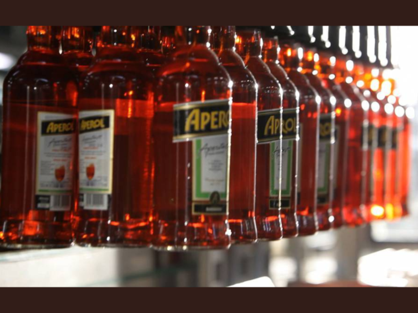 Aperol bottles on a production line