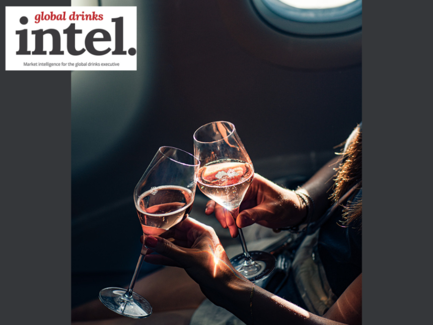 Two glasses of champagne up-close on an aeroplane with Global Drinks Intel logo