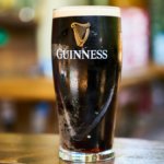 A pint of Guinness on a bar