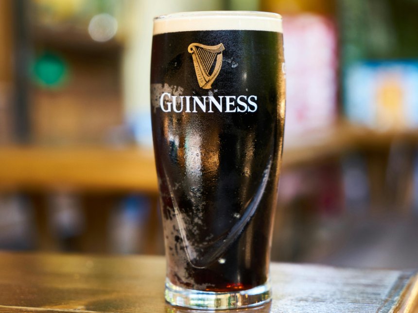 A pint of Guinness on a bar