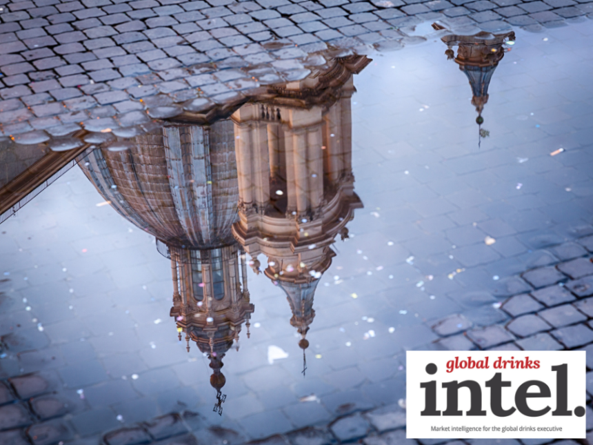 Reflection of a church in Italy in a puddle
