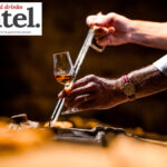 Cognac poured into a glass at Hine 's cellars