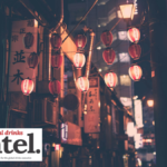 Lanterns strung across a street in an Asian city