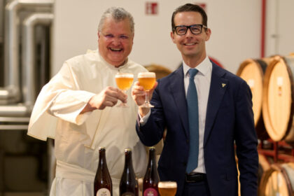 Father Karel Stautemas and Carlsberg CEO Jacob Aarup-Andersen
