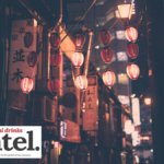 Lanterns strung across a street in an Asian city