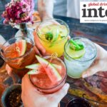 View from above of four colourful drinks
